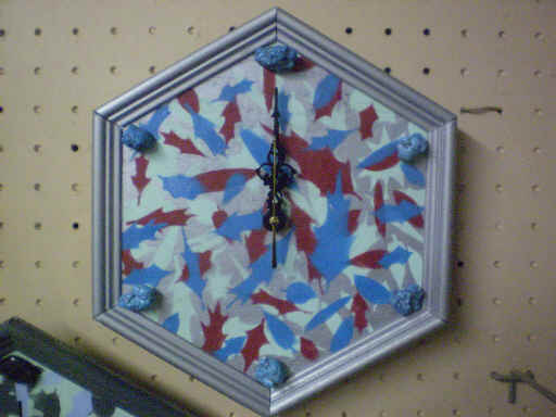 10 inch (diagonal) wall clock.Artfully painted woo