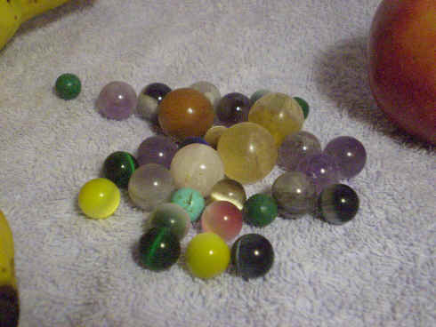 “Marbles” of assorted natural, dyed, a