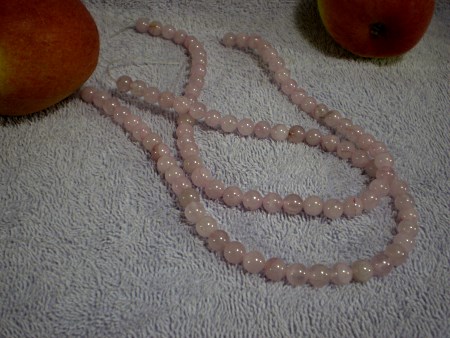 Rose quartz beads, spherical.