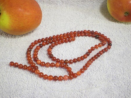 Carnelian agate beads, spherical.