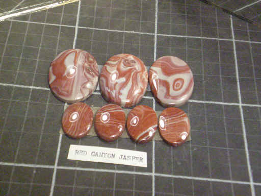 Cabochons of red canyon jasper.