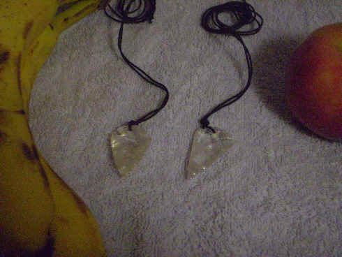 Arrowhead necklaces of clear quartz.